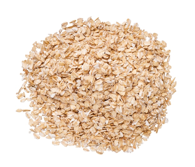 Premium Photo | Oat flakes pile top view, isolated on white background