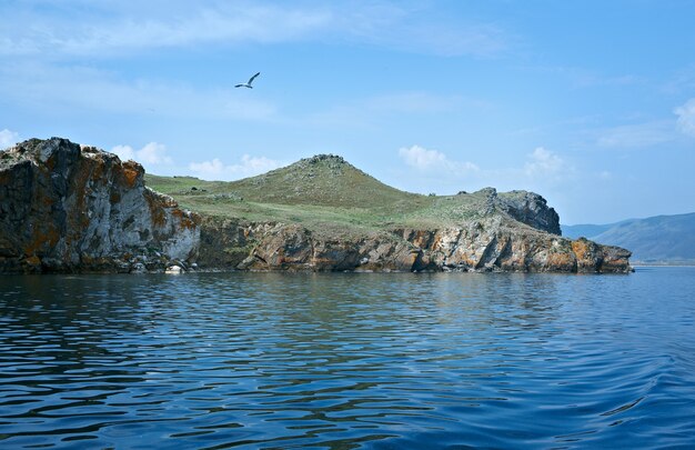 Premium Photo | Ocky cliff on the shore , olkhon island, lake baikal ...