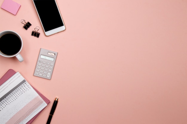 Premium Photo Office Table Desk With Smartphone And Other Office Supplies On Pink Background