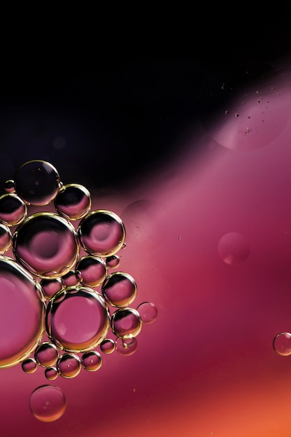 Oil drops in water abstract psychedelic pattern image Free Photo