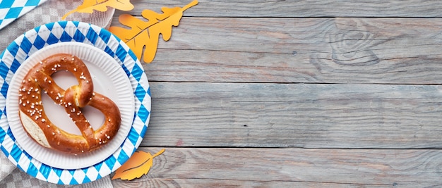 Oktoberfest Flat Lay On Rustic Wooden Table With Pretzel And