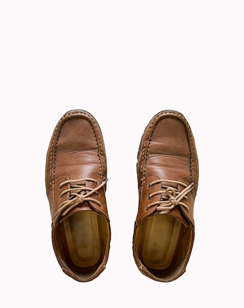 Premium Photo | Old brown leather shoes isolated