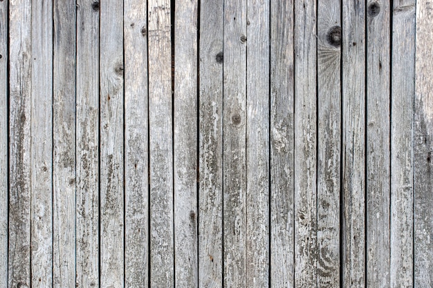 背景の古いフェンスパターンテクスチャ 縦縞 レトロな材木の納屋の壁 プレミアム写真