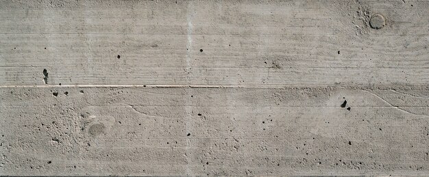 古い灰色のコンクリートの壁 具体的なテクスチャ クローズアップ モダンな灰色のコンクリート壁のテーブルテクスチャ ブロックで作られた壁 漆喰の柱 の質感 色白のコンクリートのシームレスなテクスチャ プレミアム写真