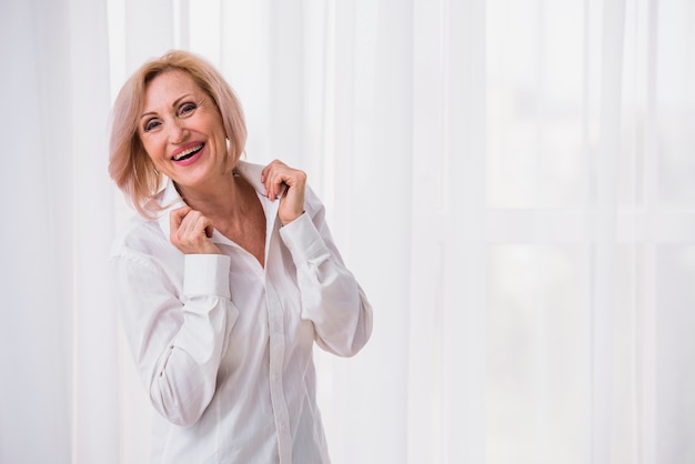 Old Lady With Short Hair Looking Happy Free Photo