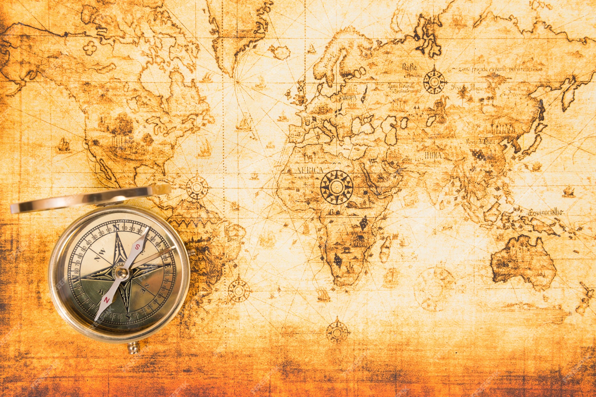 Premium Photo | Old paper map with an ancient compass on it. vintage ...