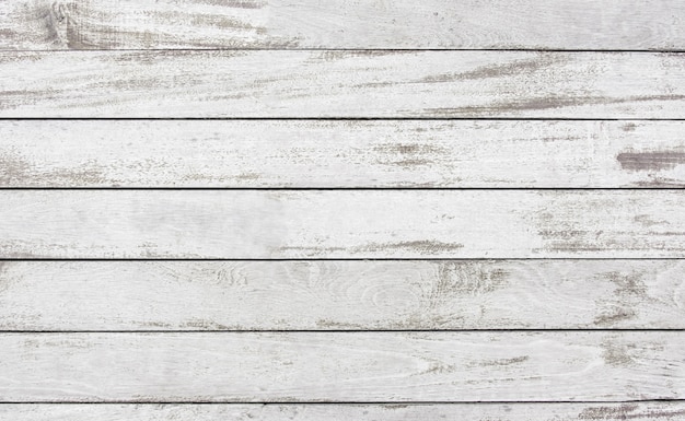 古い木の板の白いペンキ表面テクスチャ背景を剥がす プレミアム写真