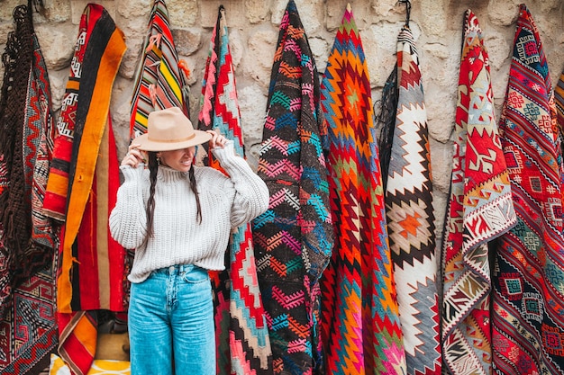 Premium Photo | Old traditional turkish carpet shop in cave house ...