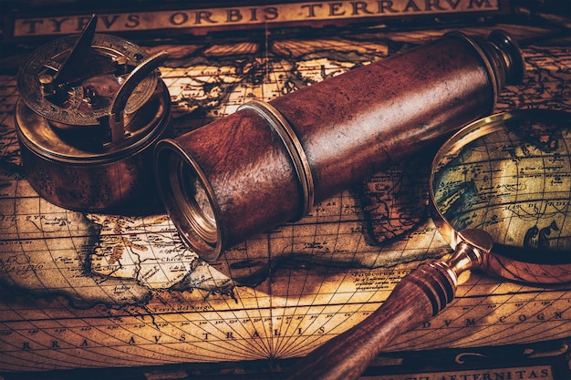 Premium Photo | Old vintage compass on ancient map