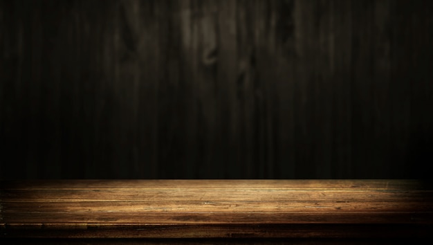 Premium Photo Old Wood Table With Dark Brown Wall Blurred Background