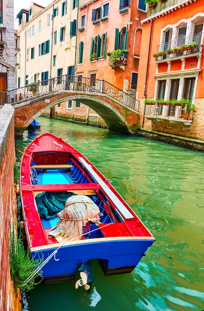 Premium Photo Old Wooden Boat On Canal In Venice Italy