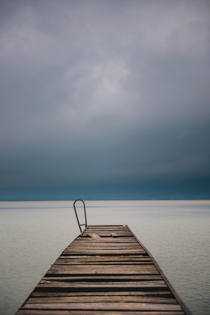 Premium Photo | Old wooden dock in summer stormy weather