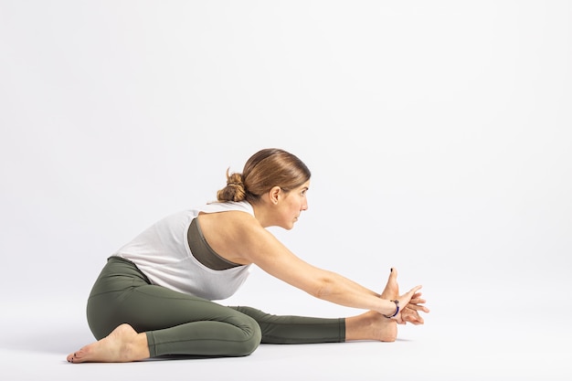 Premium Photo | One leg folded forward bend pose. yoga posture (asana)