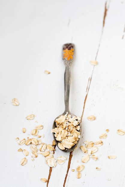 Premium Photo One Tablespoon Of Oatmeal Is A White Wooden Healthy Food