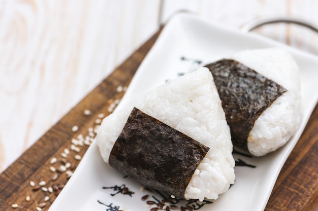 Premium Photo | Onigiri. rice triangle with nori seaweed.