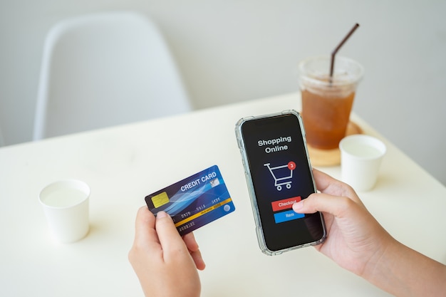 Premium Photo | Online shopping with smartphone and credit card