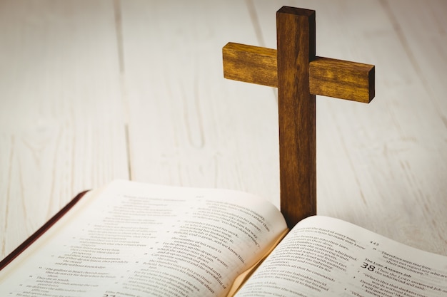 Premium Photo | Open bible and wooden cross