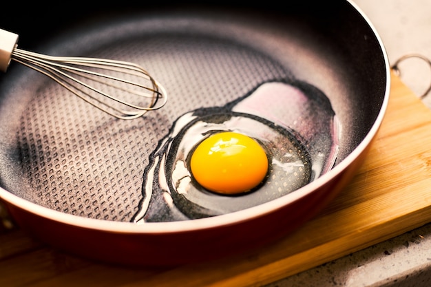 Free Photo | Open egg in a frying pan