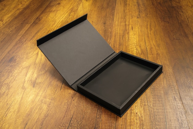 Download Open wooden black box on the floor Photo | Free Download