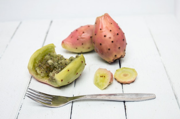 Premium Photo | Opuntia ficus-indica cactus fruits opened on a white ...