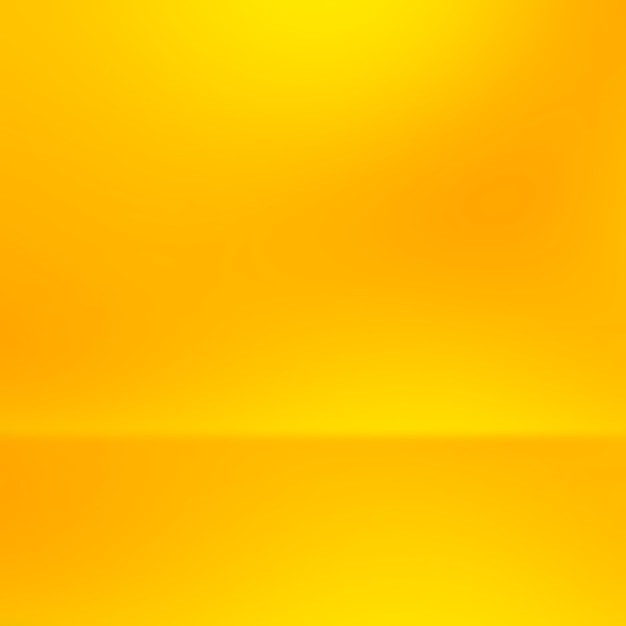 オレンジ色の抽象的なゴールドの背景が黄色 オレンジグラデーションの抽象的な背景 オレンジ色の背景 プレミアム写真