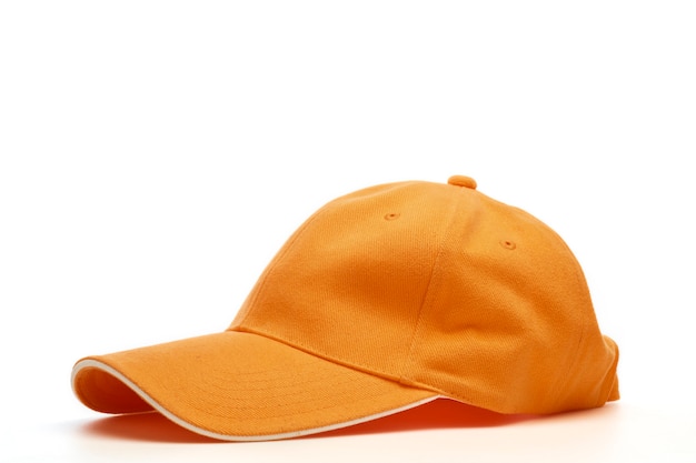 Premium Photo | Orange courier hat isolated on white surface