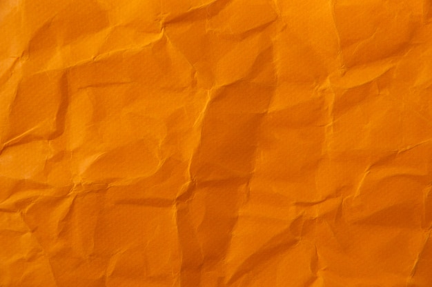 Premium Photo | Orange crumpled paper