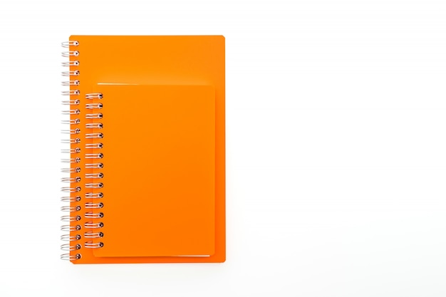 Free Photo | Orange notebooks