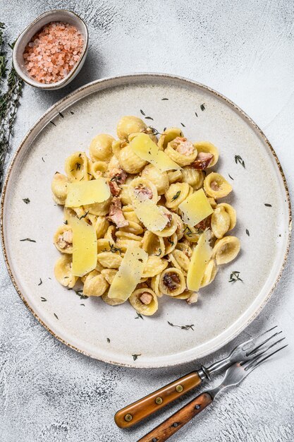 Premium Photo | Orecchiette Homemade Carbonara Pasta With Pancetta, Egg ...