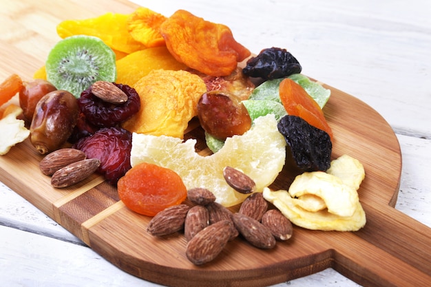 Premium Photo Organic Healthy Assorted Dried Fruit On Wine Board
