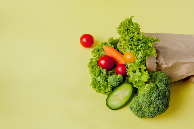 Premium Photo Organic Vegetables On Yellow Background