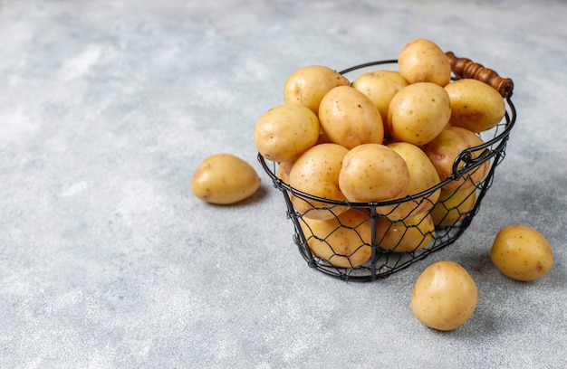 Organic white baby potatoes,top view Free Photo