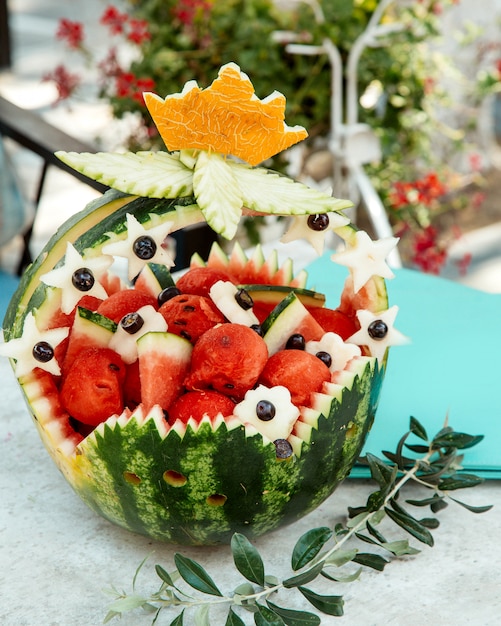 Free Photo | Ornated watermelon basket with watermelons pieces