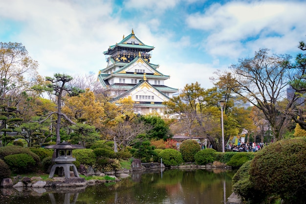 Premium Photo | Osaka castle with japanese garden and tourist ...