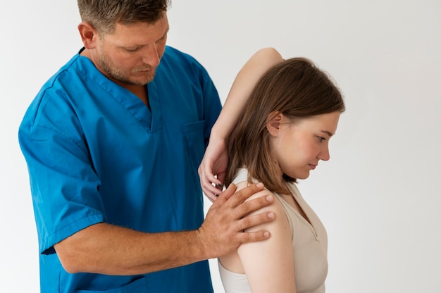 Free Photo | Osteopathy patient getting treatment massage