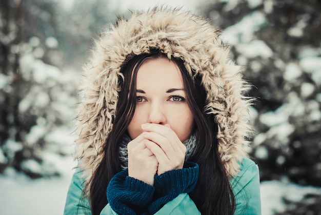 Premium Photo | Outdoor winter closeup portrait of young happy brunette ...