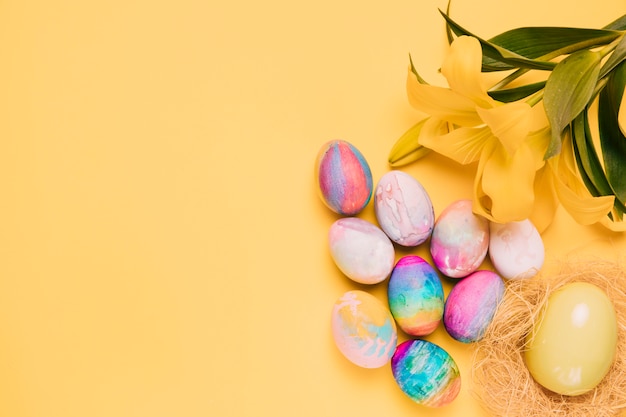 Free Photo | An overhead view of colorful easter eggs with beautiful ...