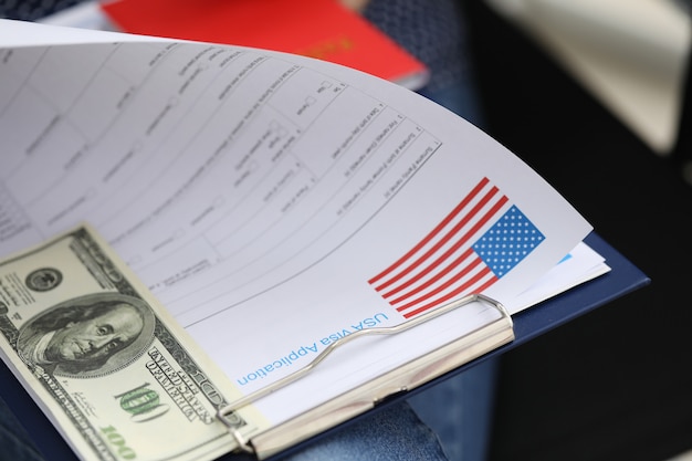 Premium Photo | Package documents for obtaining us visa and dollar