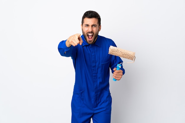 Premium Photo Painter Man Holding A Paint Roller Isolated On White