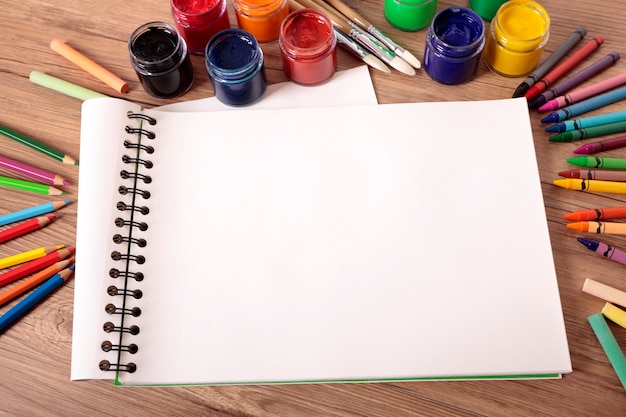 Free Photo | Painting notebook in the table