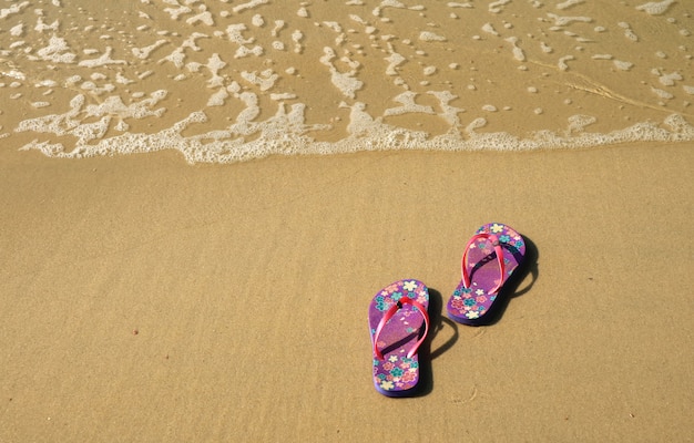 colorful flip flops on the beach