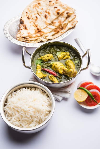 Premium Photo | Palak or spinach chicken or murg saagwala served in a ...