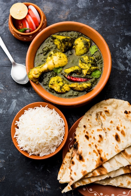 Premium Photo | Palak or spinach chicken or murg saagwala served in a ...