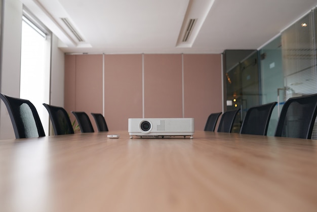 Pan Shot Of An Empty Office With The Projector In The Middle Of A