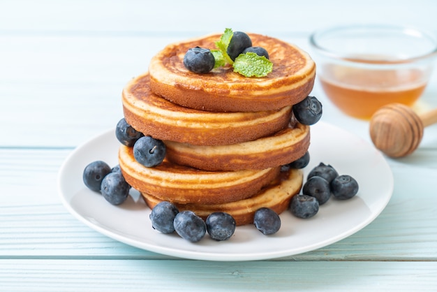 best keto sweet treats - Pancake with fresh blueberries Premium Photo