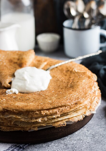 Free Photo | Pancakes crepes with sour cream russian traditional ...