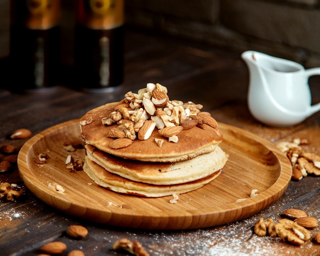 Free Photo | Pancakes topped with mixed nuts