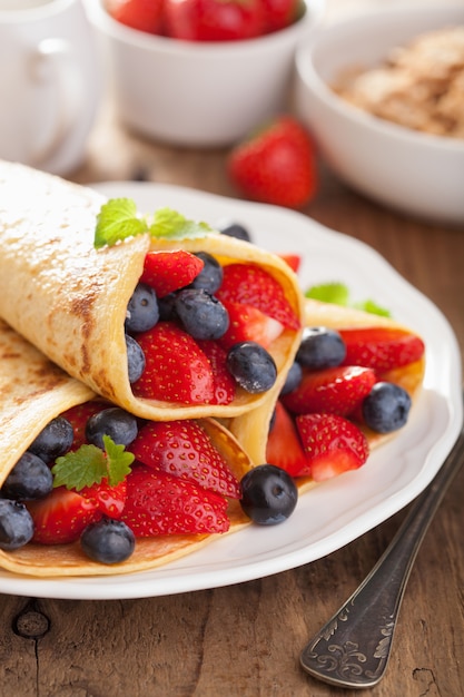 Premium Photo | Pancakes with strawberry blueberry