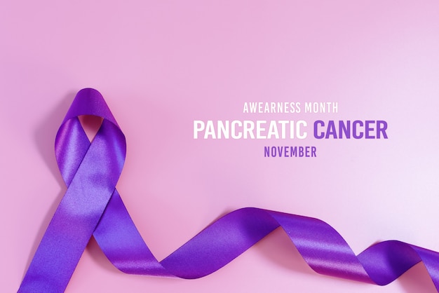 Premium Photo | Pancreatic cancer awareness ribbon purple ...