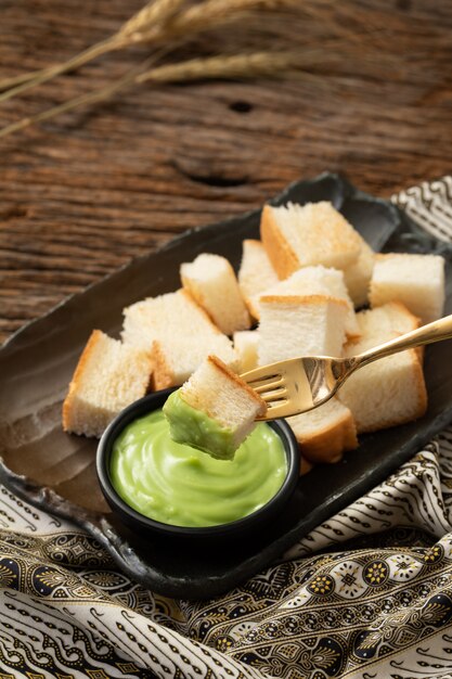 Premium Photo | Pandan custard bread thai dessert sweet